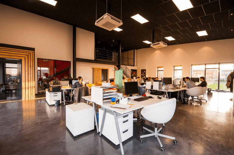 People Sitting On Chairs Beside Their Desks In An Office 1170412 768x511 1
