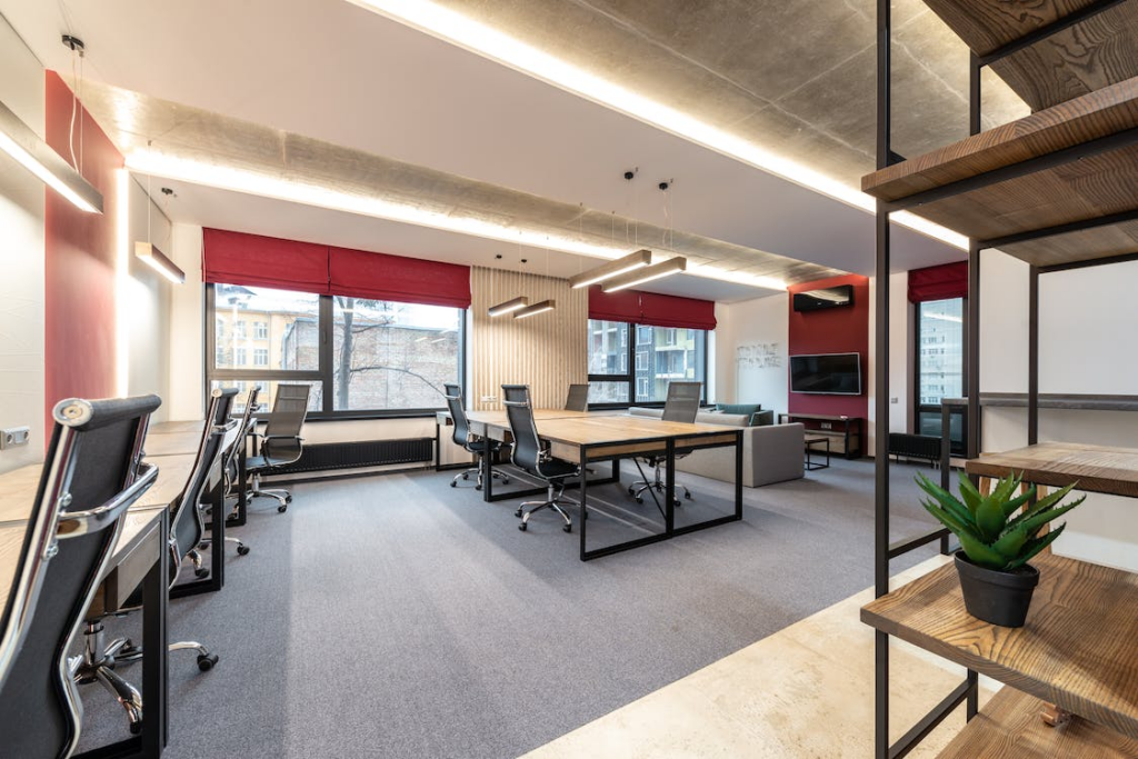 A workplace with modern office furniture and LED lighting to consume electricity effectively.