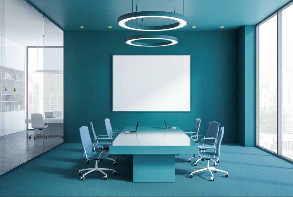 A meeting room of a finance firm with blue interiors, the colour of trust and stability.