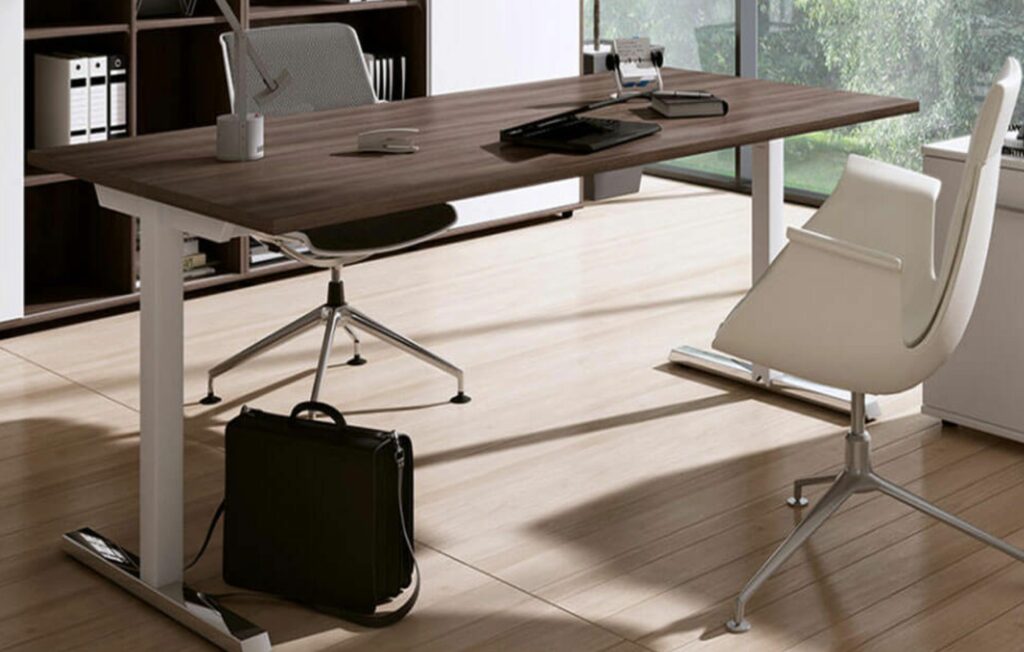 A height-adjustable operational desk.