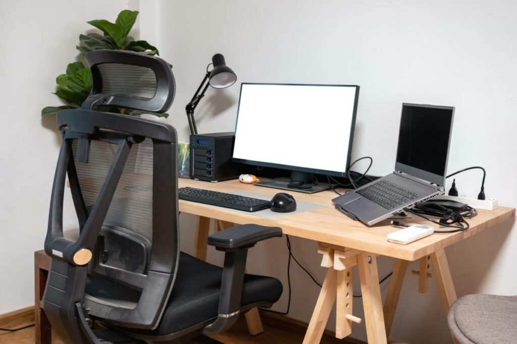 A black executive office mesh chair. 